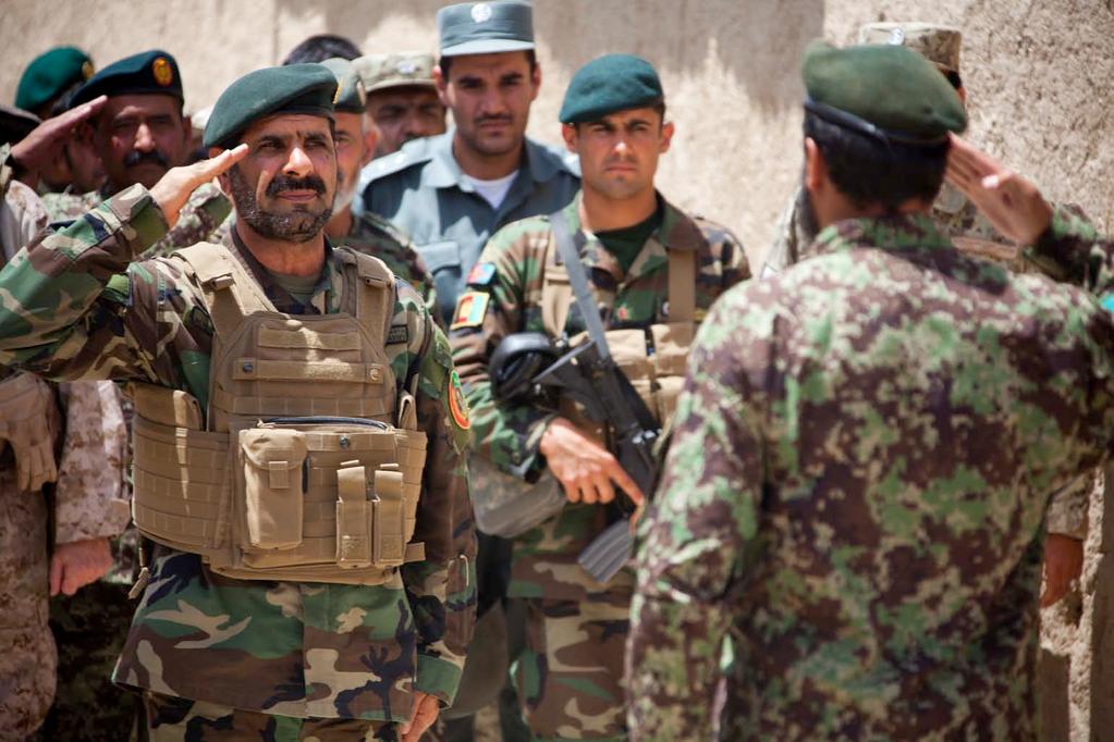 120510-M-EU691-077 Afghan National Army Maj. Gen. Sayed Malook, left, commanding general of the 215th Corps, salutes as Capt.