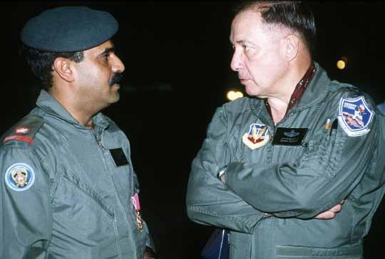 USAF photo Left: Lt. Gen. Charles Horner, the coalition air boss (r), confers with Maj. Hamad bin Abdulla Al-Khalifa of Bahrain s Shaikh Isa squadron.