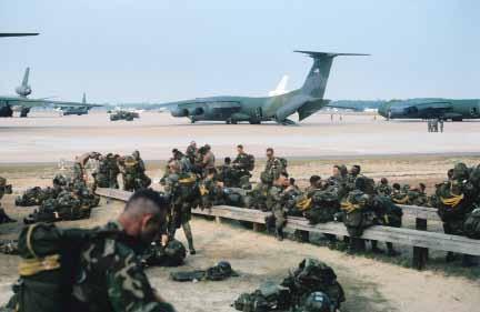Photo by Robert F. Dorr Army paratroopers prepare to board C-141s at Pope AFB, N.C. C-141s hauled a massive amount of troops and cargo. Shocking, said Mubarak later.