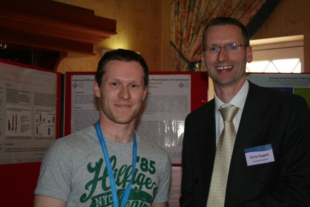 Poster prize winner Gareth Davies with Dr Chris Eggett During the final session delegates could choose to attend a device case studies session aimed at students and newly qualified physiologists, or