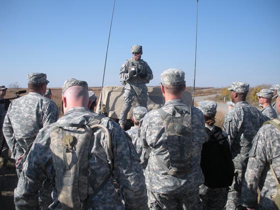 Figure 2. LTC C.J. King, 299 th BSB s commander, explains LRP operations to logistics and maintenance representatives from units across Fort Riley.
