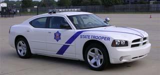 Fleet Report: The Arkansas State Police purchased a total of 243 vehicles. This included 51 Chevy Impalas, 14 Ford Tauruses, 110 Ford Crown Victorias, 40 Dodge Chargers, 2 Chevy Ext.