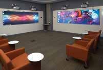 Large format displays and projection systems, voice lift systems, and wireless microphones for audio video conferencing all work in concert to augment communications for larger audiences.