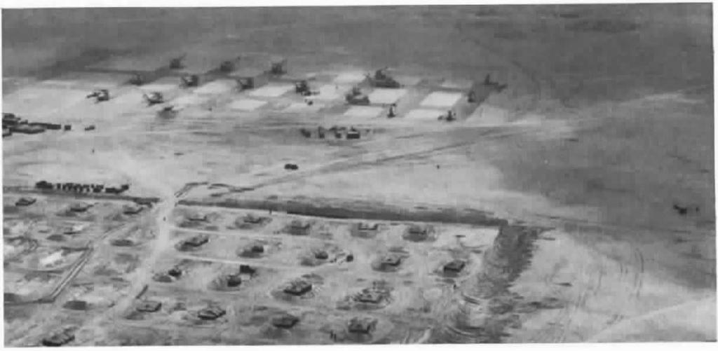 wrr THE I MARINE EXPEDITIONARY FORCE IN DESERT SHIELD AND DESERT STORM 57 Aerial view was taken on 21 February 1991, of a portion of Marine Aircraft Group 26's Landing Zone "Lonesome Dove, located