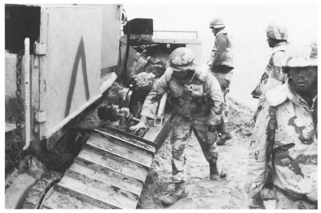78 U.S. MARINES IN THE PERSIAN GULF, 1990-1991 A a A Direct Support Command armored D-7 Caterpillar was disabled by a mine while attempting to widen Lane Blue 3 of the 2d Marine Division's breach.
