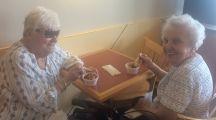Residents at Temple Israel enjoying a live musical performance. Two of our residents enjoying an afternoon stop for frozen yogurt!