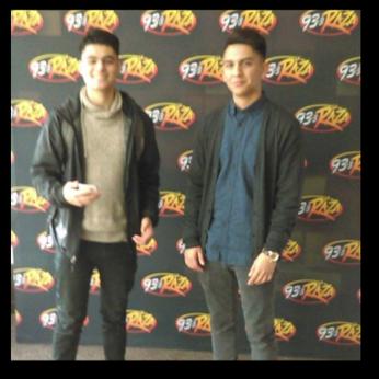 Left Photo: Peer Outreach Advisors Dyonis and Erik pose in front of 93.3 La Raza s backdrop.
