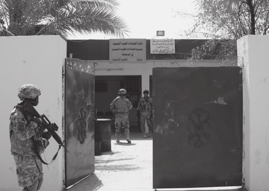 Soldiers enter the public clinic for inspection of local contractor work. number of Soldiers.