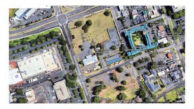 Located in Kahului, Kane Street intersects Kaahumanu Avenue and Vevau Street and the site is located across from the Queen Kaahumanu Mall, the current location of the Maui Bus transit center.