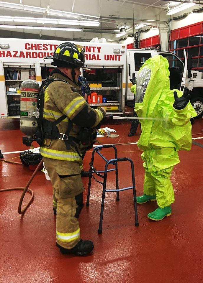 The hazmat team set up their technical decontamination line and provided hands on training with the process to decontaminate a responder.