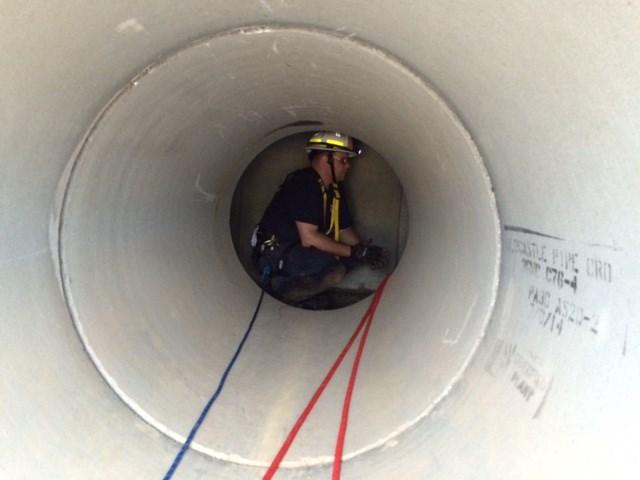 All of the vaults have access via manholes on top and through the interconnecting pipes. Photo Credit: ArcelorMittal using the prop for training.