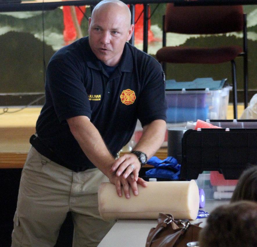 Page 8 Stop the Bleed Training Held in Cherokee County Sgt. Nate Sullivan instructs school employees in Cherokee County on how to stop the bleed.
