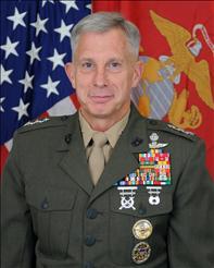 His company grade assignments included platoon and company commander billets with both the 1st and 2nd Marine Divisions; Commanding Officer of the Marine Detachment aboard the USS Long Beach (CGN-9);