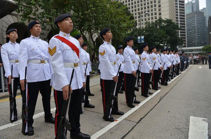 About 50 Instructors and Cadets attended the National Day Flag Raising Ceremony at Golden Bauhinia Square on 1 October; b.
