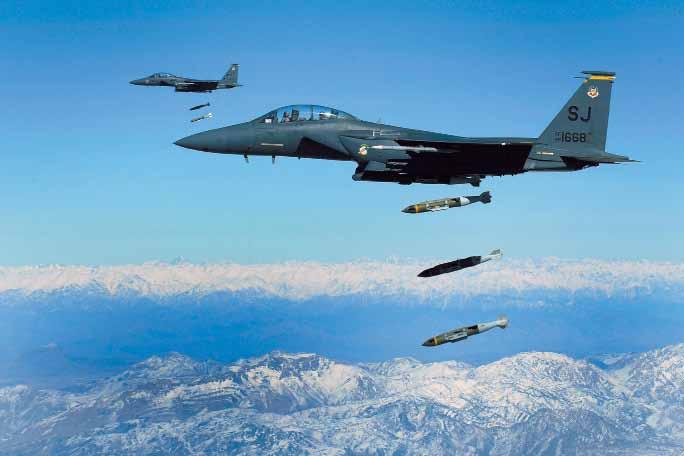 USAF photo by SSgt. Michael B. Keller USAF F-15E fighters drop 2,000-pound Joint Direct Attack Munitions on a cave in eastern Afghanistan. AP photo F-15E pilot and vice commander of the 455th.