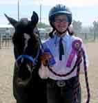 Lizzy Marshall won a grand champion ribbon in Junior Western Equitation, Junior Showmanship and Junior Western Pleasure and a red