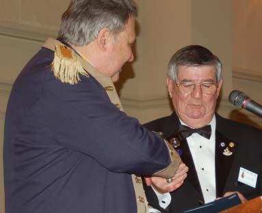 Lawrence presents immediate Past President