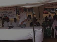 Above: The Federation Head of Sub-Regional Office, the Nigerian Red Cross President and PLWHA Coordinator at ceremonies celebrating World Red Cross and Red Crescent Day 2004 Rally at Refugees Camp in