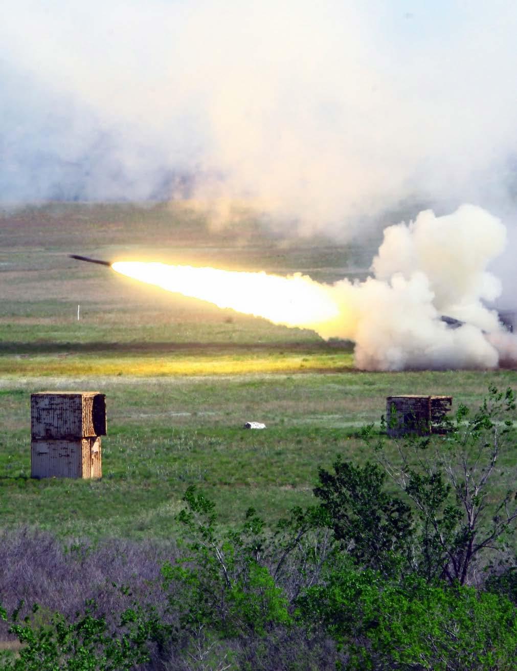 Soldiers from 1st Battalion, 78th Field Artillery, fire a High Mobility Artillery Rocket System (HIMARS) during a live-fire training and demonstration May 3, 2013, at Contingency Operations Location