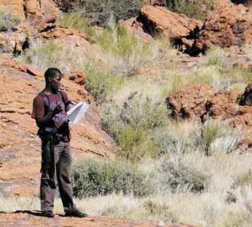 Rhodes University Geology Honours student mapping shear stones in the Northern Cape.