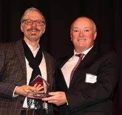 billion. Peter Rice, General Manager Capital Markets at Origin Energy Limited (l) accepted the Award from Ian Fulton of Senses Direct.