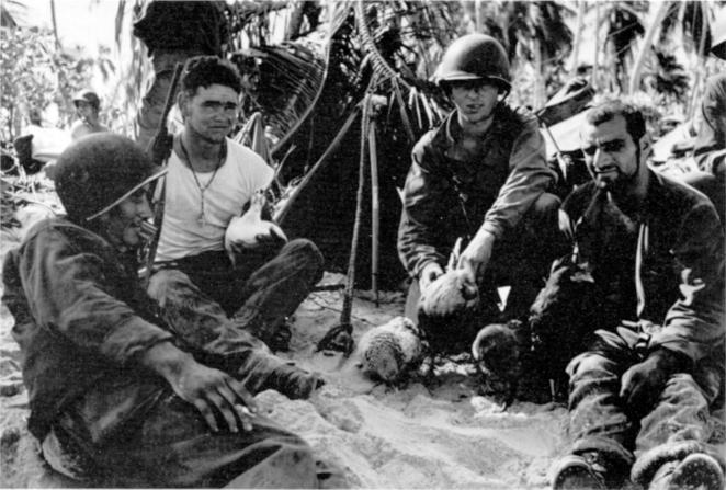 Soldiers from the shore party rest on Yellow Beach afer the successful assault. (DA photograph) Largely as a result of the earlier U.S. Marine raid on Makin, the Japanese had garrisoned Butaritari as a seaplane base with a total strength of about 800 men by the time of the 27th Division landings.