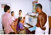 Local content: Pondicherry, India Knowledge Centre staff at Embalam village explaining use of RealAudio