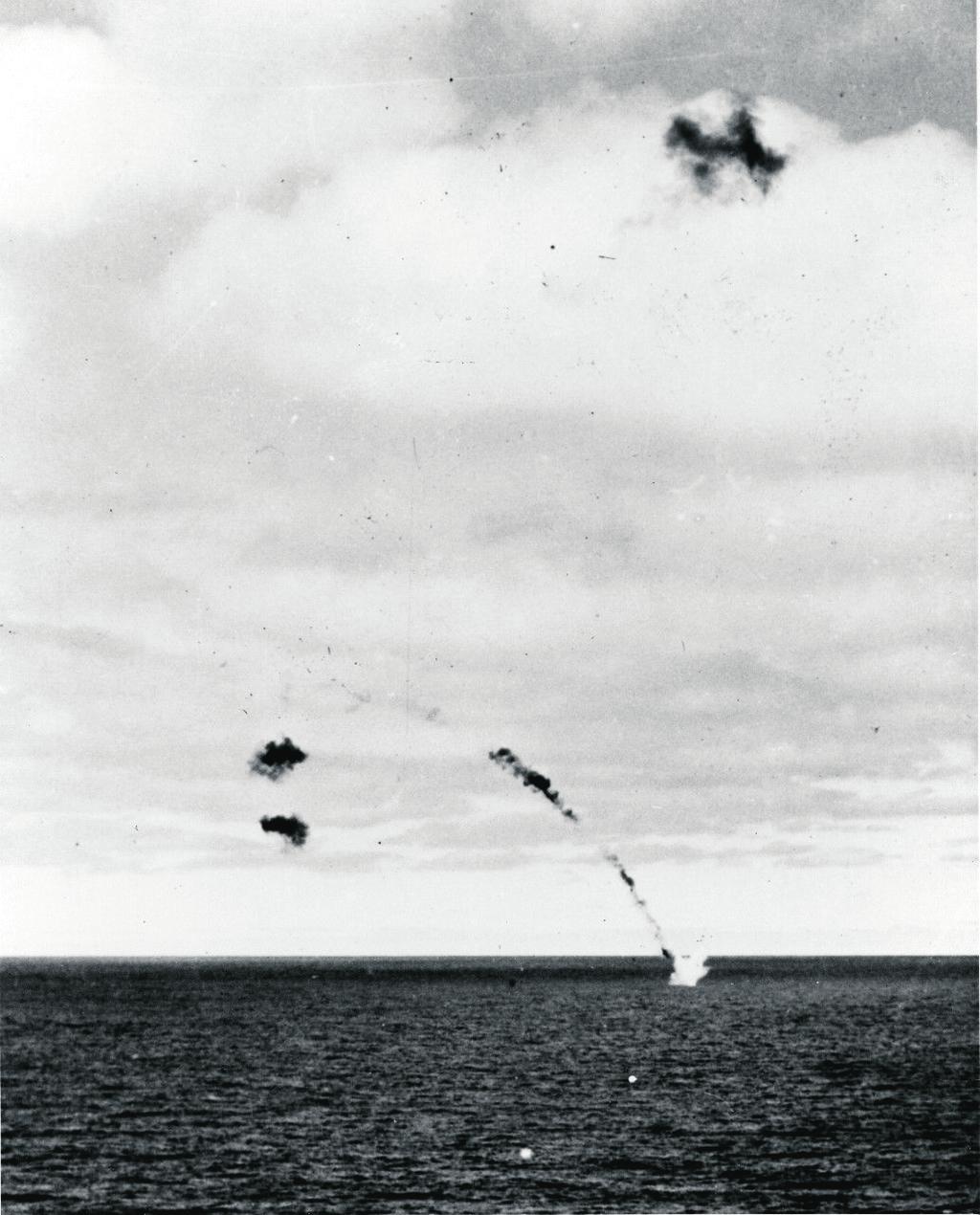 Activity: Making a Difference: Service & Sacrifice At The Battle Of Midway Document Group B Photograph, A Japanese Type 97 shipboard attack aircraft is shot down while attempting to deliver a torpedo
