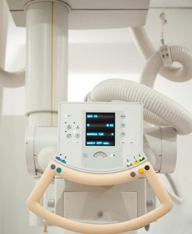 THE X RAY MACHINE A er you speak with the doctor, you will go to a room that has special