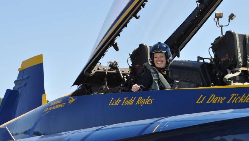 They are selected based on their impact on the community, particularly youth. Designated the primary flyer, Heidi s ride in the two-seat, Number 7 F/A-18 Hornet jet took place on Monday, August 1.