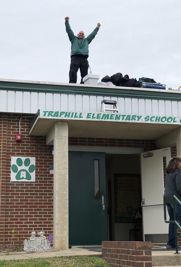 Traphill Elementary Raises the Roof for Reading Students at Traphill Elementary were very excited to see their principal, Mr. Ortiz go on the roof on Monday, April 23rd.
