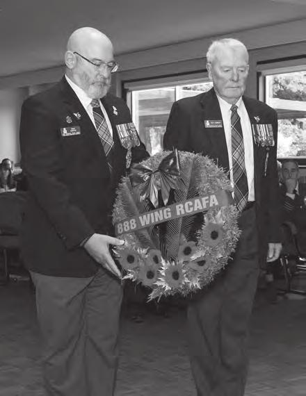 Col (ret d) Ted Gibbon and CWO (ret d) Daniel Coutu lay a wreath during the Battle of