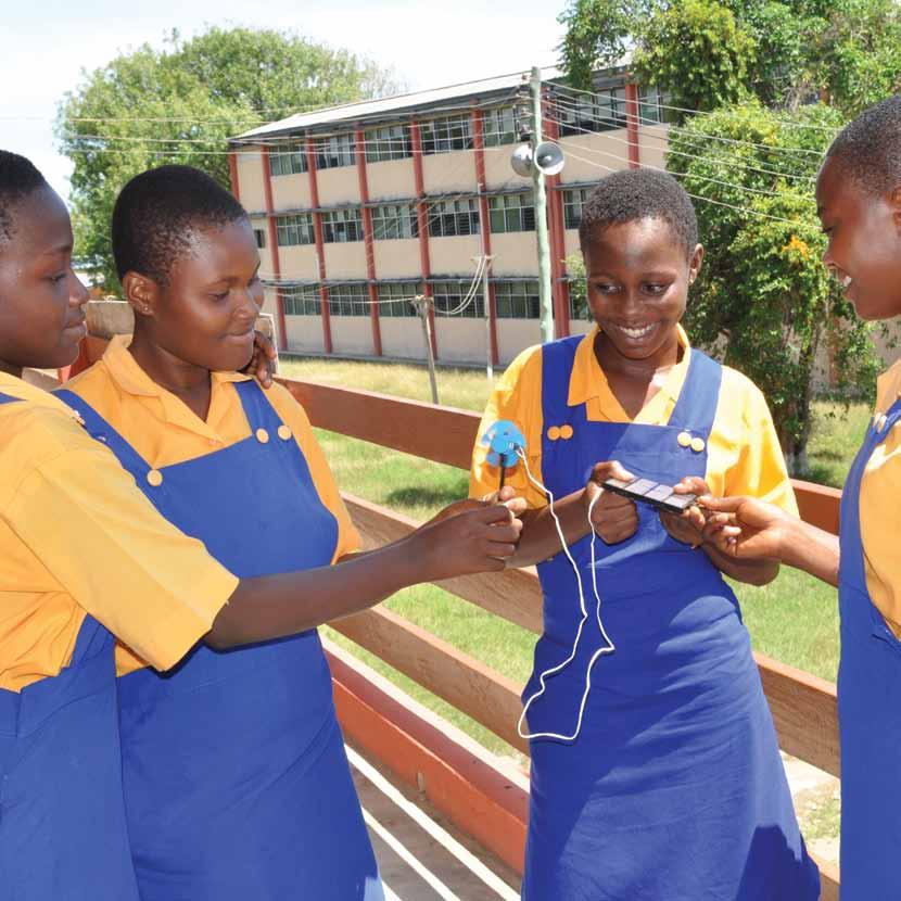 Ghanaian pupils testing solar energy: encouraging girls to engage with physics is one of IOP s key educational aims.