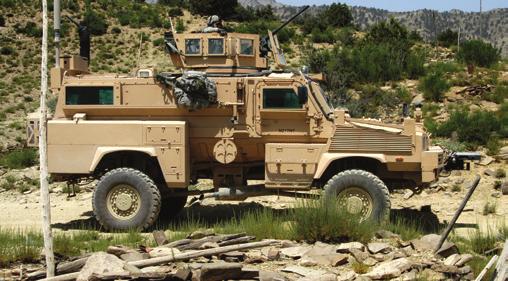 Newly delivered mine resistant ambush protected vehicles (MRAPs) traveled 5 hours over dangerous dirt roads to transport Charlie Company to the Charbaran outpost.