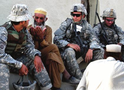 A tribal elder speaks during a shura, or council meeting, in Paktika Province as an