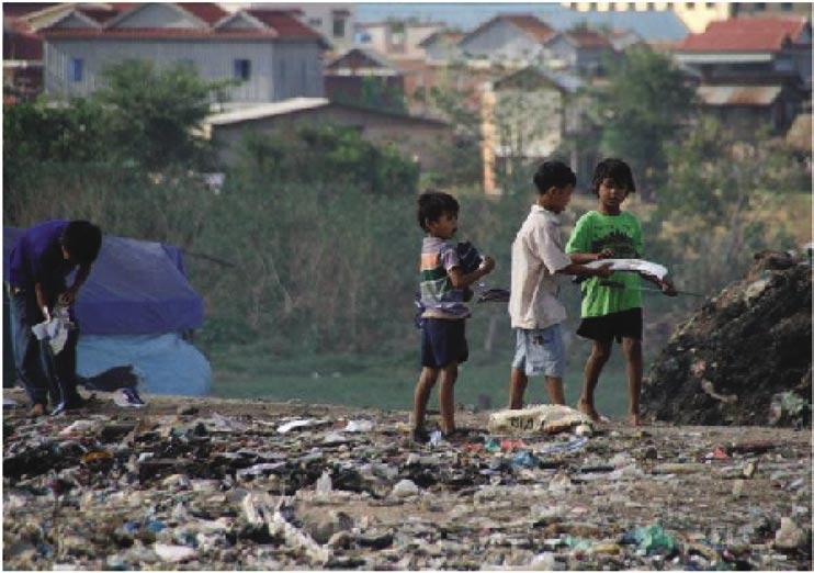 Insert OF-1D: Rotary News: Cambodia s Children Waste-Pickers Receive Vital Services Phnom Penh, Cambodia February 12, 2014. Phnom Penh s city landfill is at capacity.