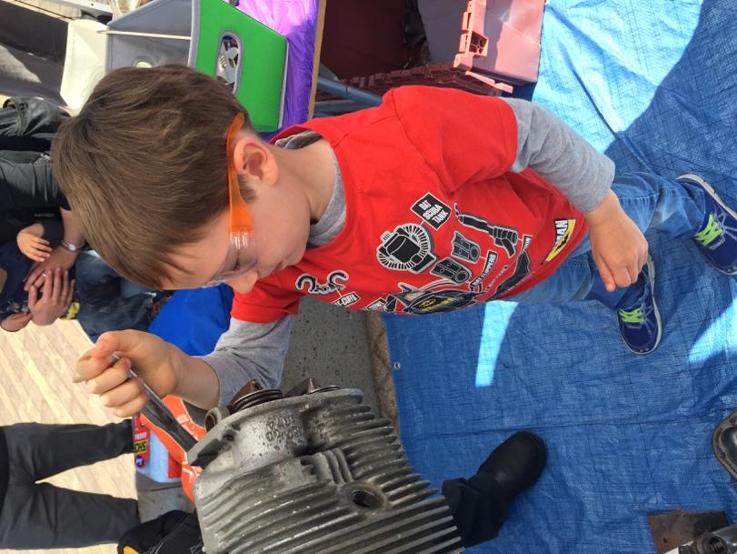 Over 1,400 people come through the event to tinker with their families and friends and according to Bay Cities 99s organizer Christine Malcomson-Young the Take Apart Aircraft Engine exhibit was one