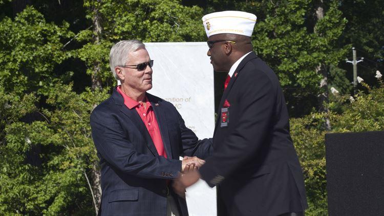General (Ret) James F. Amos, left, 35th Commandant of the Marine Corps, and Forest E.