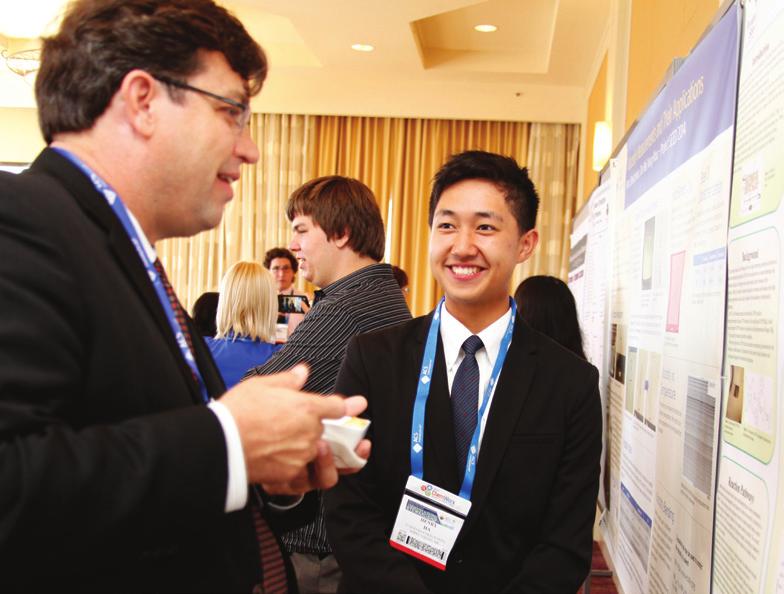 Right: Henry Ha presents his research to Project SEED Committee Member and mentor Don Warner at an ACS National Meeting.