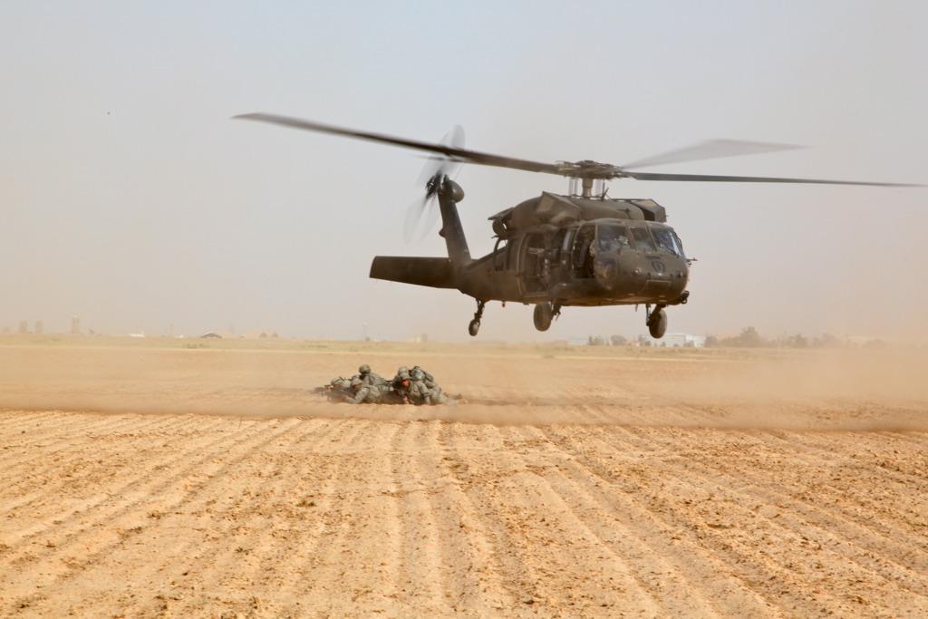 U.S. Soldiers of Bravo Company, 2nd Battalion, 25th Combat Aviation Brigade provide hands on Aerial Quick Reactionary Force (AQRF) training on a UH-60 Blackhawk to U.S. Soldiers assigned to 1st