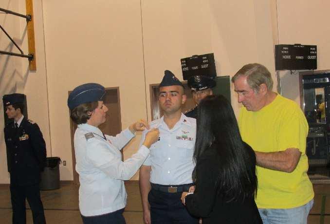 Little receive their promotions to cadet chief master sergeant. Freimanis has been a member of CAP and the squadron since February 2013, Little since July 2013.