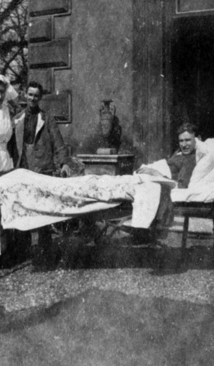 A nurse and patients at the hospital at Walton-on-Thames, England.