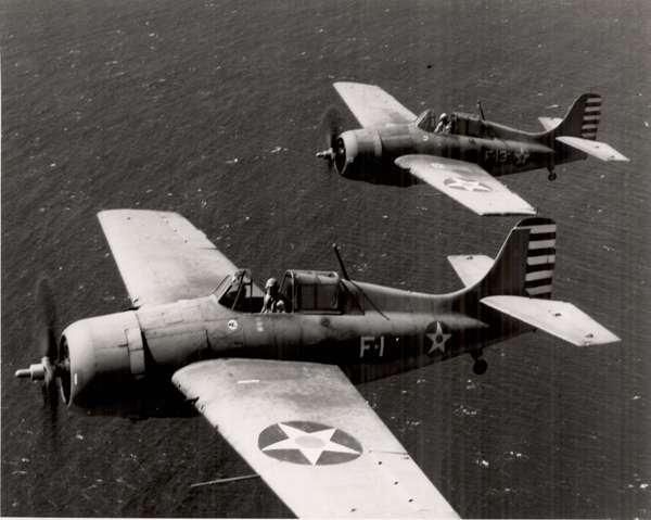 Grumman F4F Wildcat fighters from VF-6 flying from Enterprise, spring 1942, are similar to the