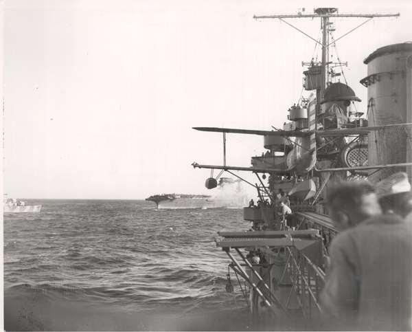 Lexington being abandoned as seen from an escorting heavy cruiser,