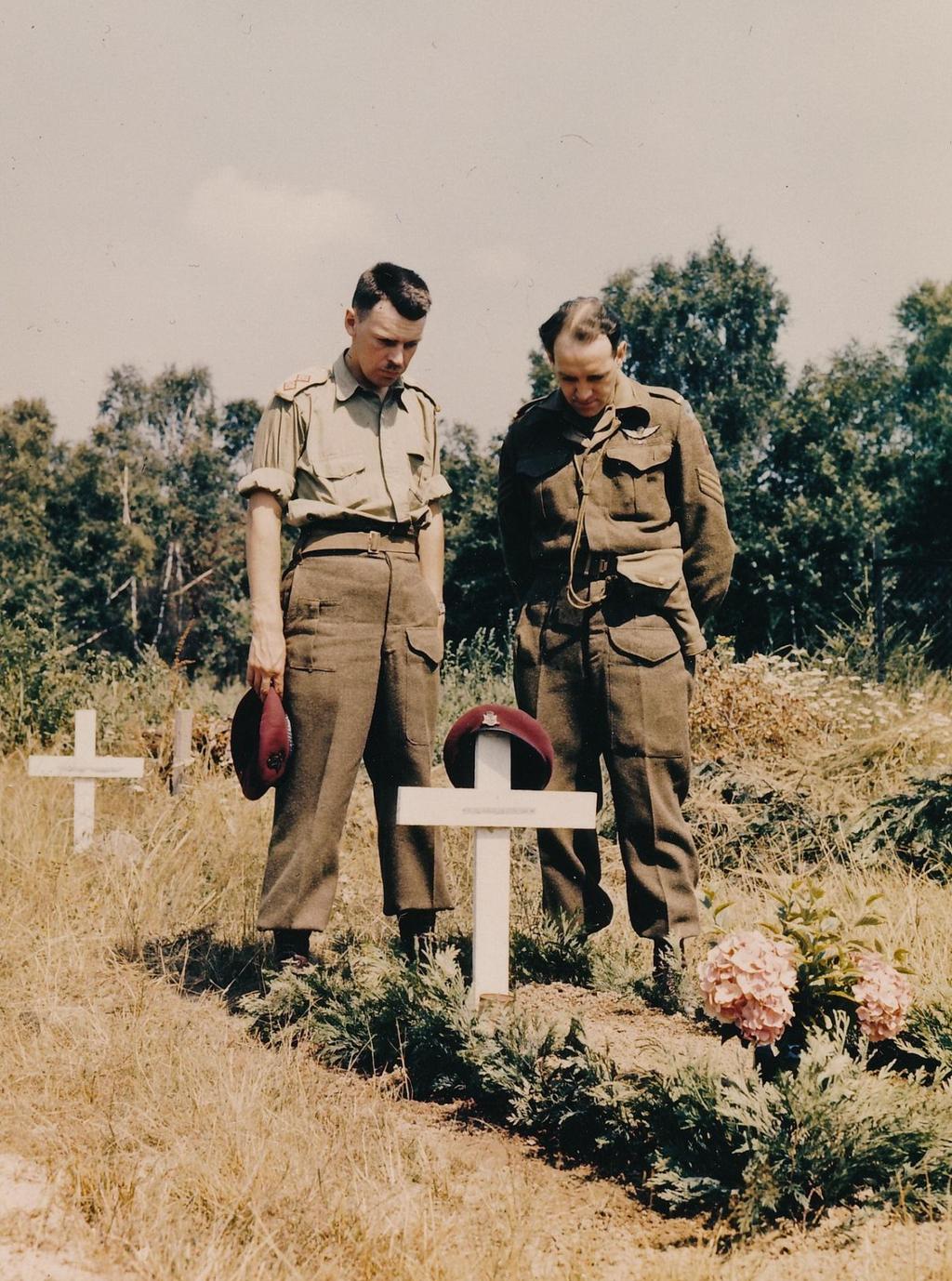 Lt. Richer (L) standing at the gravesite of Lt. Col.