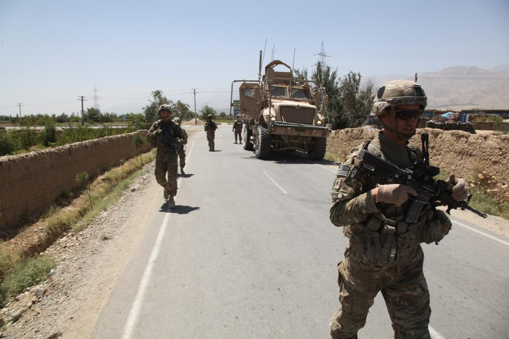 U.S. soldiers with Red Platoon, Apache Troop, 1/75th Cavalry Battalion, 2nd Brigade, 101st Airborne Division (Air Assault), continue on patrol along
