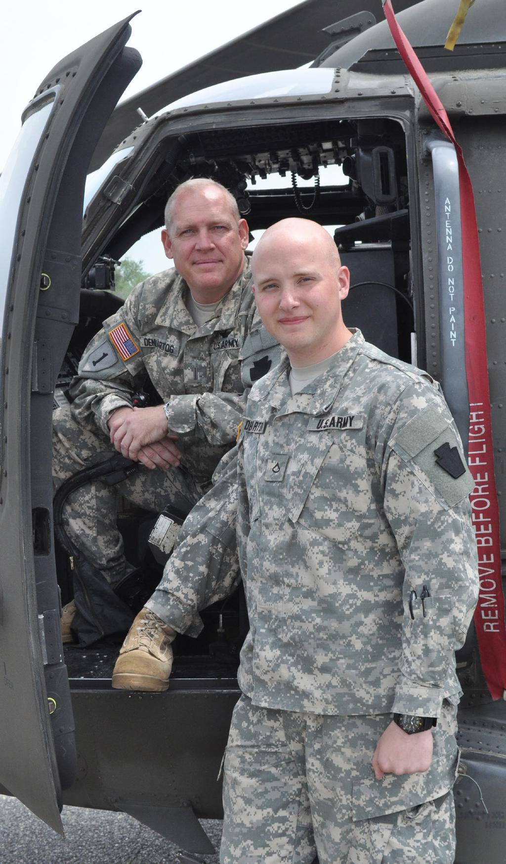 Chief Warrant Officer 5 James J. Denhartog and his son, Pfc. Eric J. Denhartog are deploying to Kosovo as part of a United Nations security and support mission.