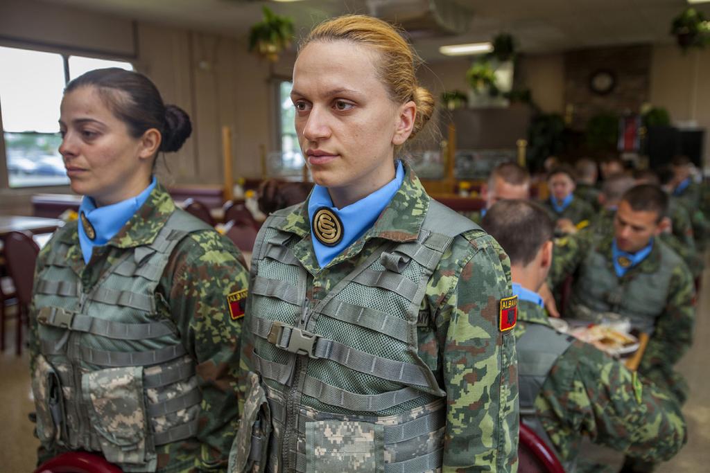 The platoon sergeant shouting the marching cadence is a woman a rarity in the former communist-bloc nation. It s difficult being a woman in the Albanian army, said Officer Candidate Ermiona Laci.